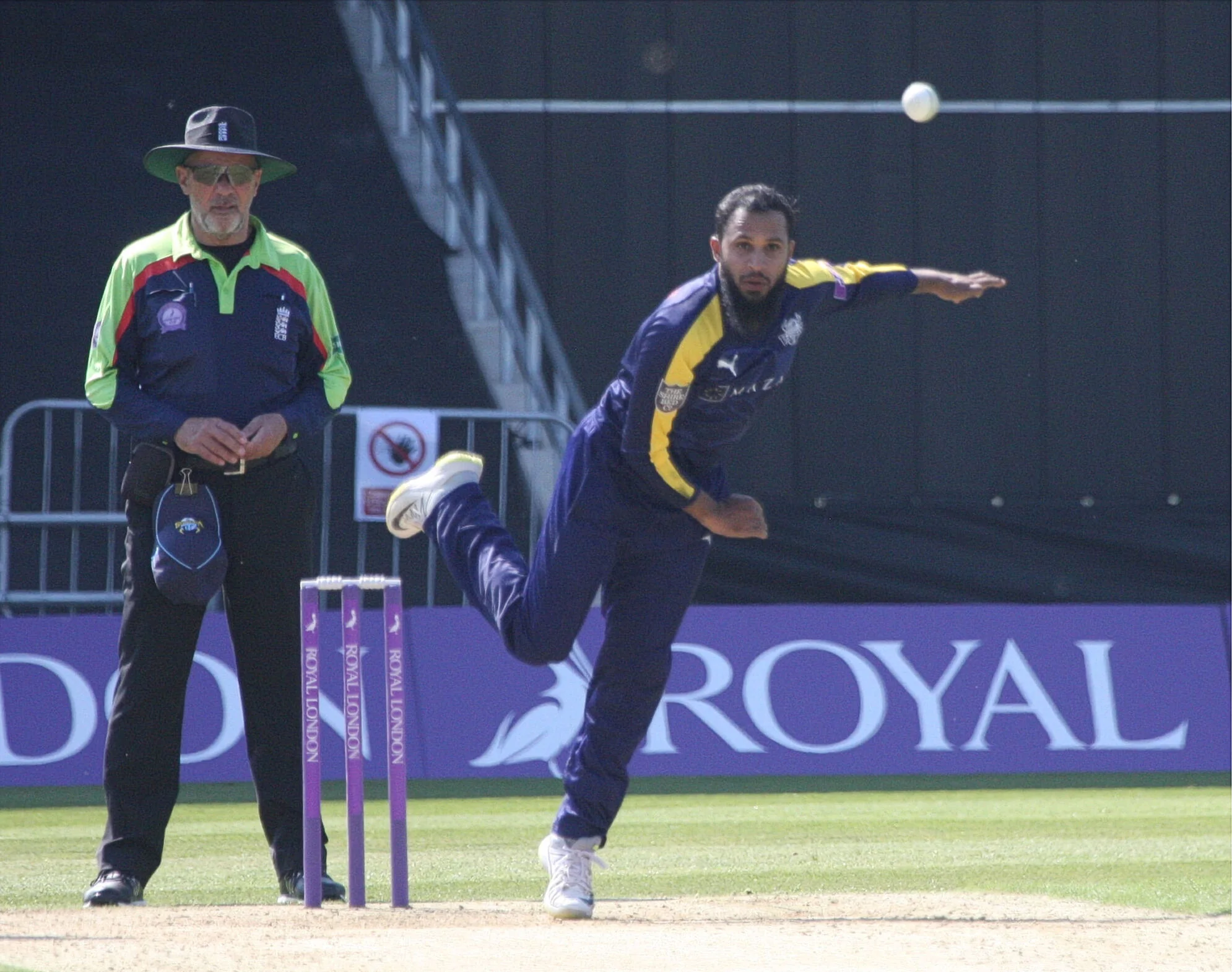 Adil Rashid in his delivery stride for Yorkshire